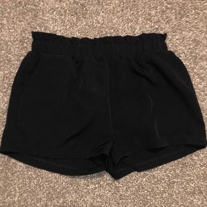 Charlotte Russe black Floyd dress shorts.